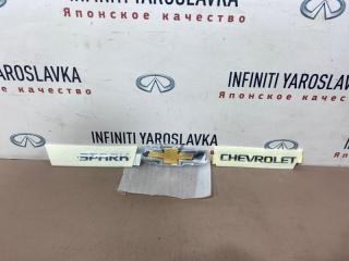 Запчасть эмблема крышки багажника Chevrolet Spark 2010