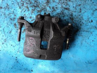 Суппорт передний правый NISSAN TINO