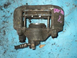 Суппорт передний левый MAZDA DEMIO