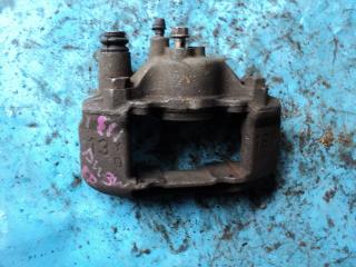 Суппорт передний правый MAZDA DEMIO