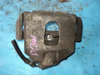 Суппорт передний левый MAZDA DEMIO