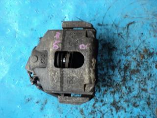 Суппорт передний правый MAZDA DEMIO