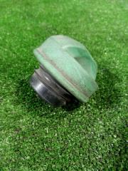 Фото запчасти крышка топливного бака Mitsubishi Carisma контрактная запчасть Запчасть крышка топливного бака Mitsubishi Carisma