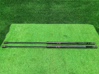 Фото запчасти амортизатор капота Toyota Camry 2006 контрактная запчасть Запчасть амортизатор капота Toyota Camry 2006