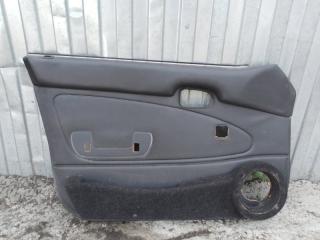 Обшивка двери передняя левая Toyota Corolla 1999