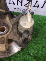 Суппорт тормозной передний правый Mazda Demio 2004