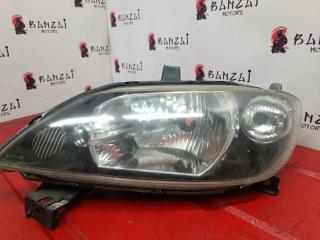 Фара галогеновая передняя левая Mazda Demio 2004