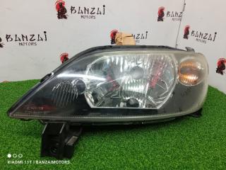 Фара галогеновая передняя левая Mazda Demio 2004