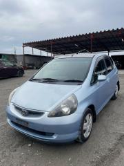 Бампер передний левый Honda Fit 2002