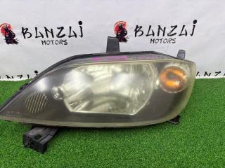 Запчасть фара галогеновая передняя левая Mazda Demio 2004