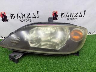 Запчасть фара галогеновая передняя левая Mazda Demio 2003