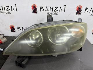Запчасть фара ксеноновая передняя левая Mazda Demio 2004