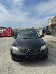 Капот Mazda Demio 2003