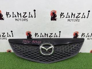 Решетка радиатора передняя Mazda Demio 2003
