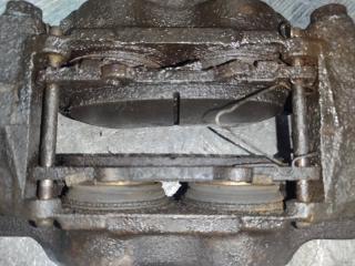 Суппорт тормозной передний левый TOYOTA PRADO 150