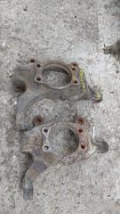 Кулак передний левый Nissan Teana