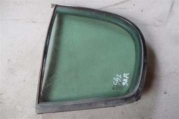 Стекло двери заднее левое Nissan Almera 2000