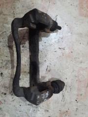 Скоба суппорта передняя левая Subaru Legacy 1996
