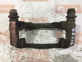 Скоба суппорта передняя правая Nissan Almera 2014