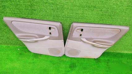 Запчасть обшивка дверей задняя MAZDA CAPELLA 2001