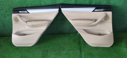 Запчасть обшивки дверей пара задние BMW X3 2010