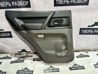 Запчасть обшивка боковой двери задняя левая Mitsubishi Montero