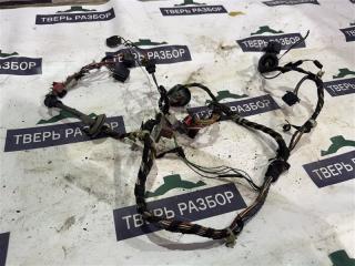 Запчасть проводка двери передняя левая Skoda Octavia