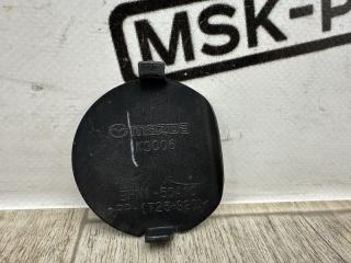 Заглушка буксировочного крюка передняя Mazda3 2014