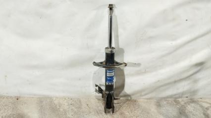 Амортизатор передний левый Nissan AD 2001