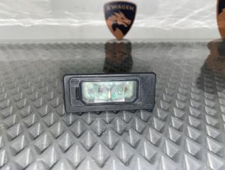 Фото запчасти подсветка номера Land Rover Discovery Sport 2018 контрактная запчасть Запчасть подсветка номера Land Rover Discovery Sport 2018