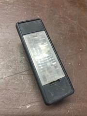 Фото запчасти подсветка номера передняя CITROEN C4 Б/У запчасть Запчасть подсветка номера передняя CITROEN C4