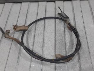 Трос стояночного тормоза левый Nissan Primera 2006-