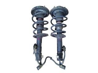 Запчасть стойка передняя Nissan Primera 2001