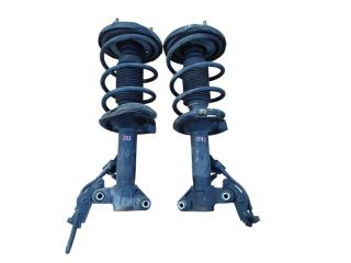 Запчасть стойка передняя Nissan Primera 2003