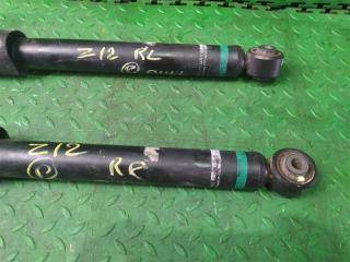 Амортизатор задний NISSAN CUBE Z12 HR15DE 3 ракурс