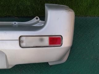 Бампер задний TOYOTA CAMI J102E 4 ракурс
