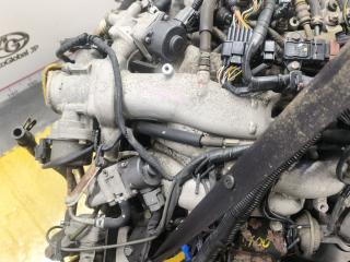 Двигатель MITSUBISHI PAJERO V25 6G74 MD976003 3 ракурс