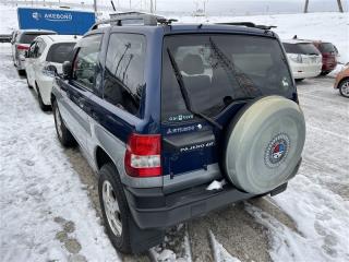 Патрубок радиатора MITSUBISHI PAJERO IO H66W 4G93 MR314124 5 ракурс