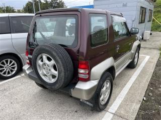Уплотнительная резинка багажника задняя MITSUBISHI PAJERO JUNIOR H57A 4A31 MR180084 4 ракурс