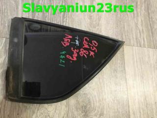 Стекло двери заднее левое Mitsubishi Lancer Cedia 2003