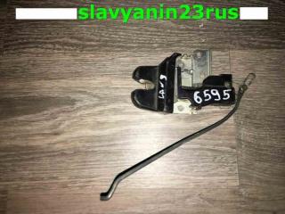 Замок багажника Mitsubishi Lancer