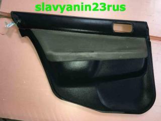 Обшивка двери задняя левая Mitsubishi Lancer Cedia 2002