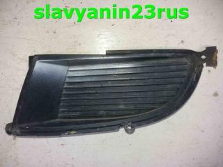 Заглушка бампера передняя левая Mitsubishi Lancer Cedia 2003