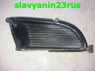 Заглушка бампера передняя правая Mitsubishi Lancer Cedia 2003