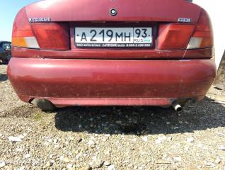 Бампер задний Mitsubishi Carisma 1998