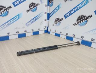 Амортизатор крышки багажника задний Mazda Demio 2003