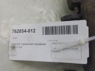 Суппорт тормозной Ford Focus 1478514, передний левый