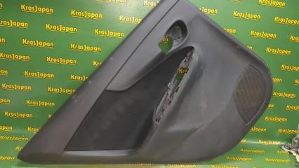 Обшивка боковой двери задняя левая Toyota Corolla Fielder 2009