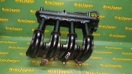 Коллектор впускной Honda FIT 2004