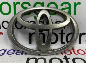 Запчасть эмблема крышки багажника Tyota Camry